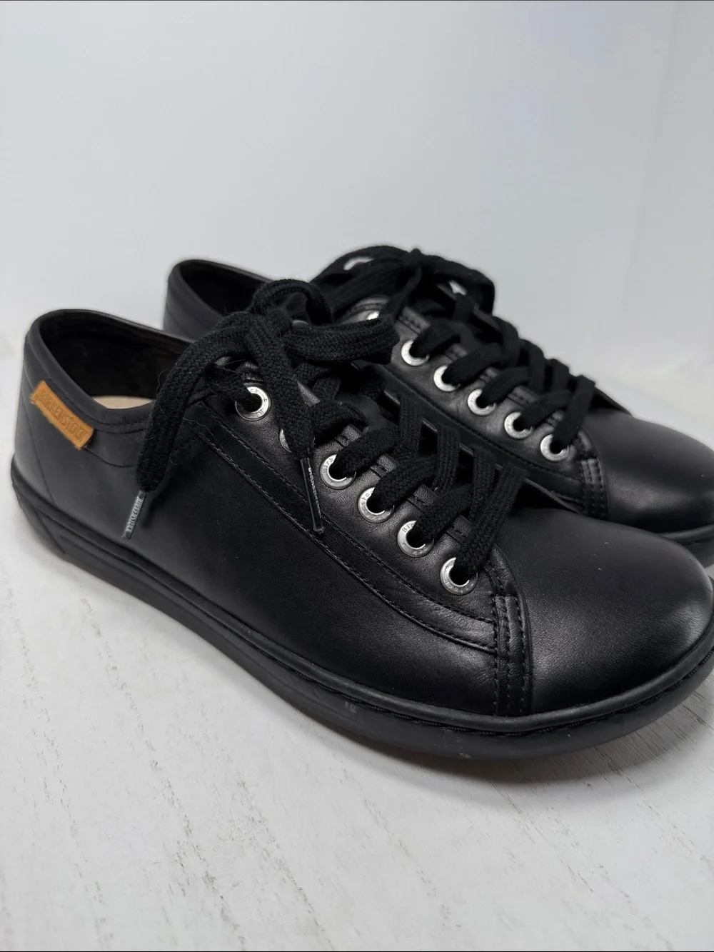 Birkenstock Black Leather Low-Top Sneakers with Tan Logo Tab